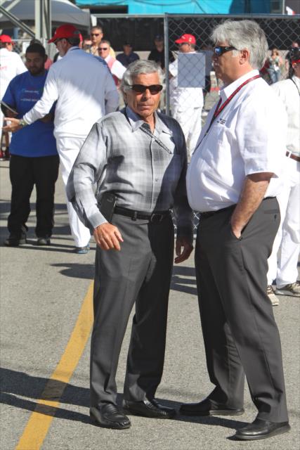 Long Beach Grand Prix CEO Jim Michaelian and Hulman and Company CEO Mark Miles chat in the paddock -- Photo by: Richard Dowdy