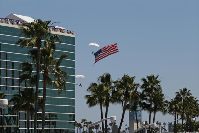 The American flag arrives during pre-race festivities for the Toyota Grand Prix of Long Beach -- Photo by: Richard Dowdy