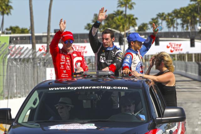 The podium of Simon Pagenaud, Scott Dixon, and Helio Castroneves waive to the crowd following the Toyota Grand Prix of Long Beach -- Photo by: Richard Dowdy