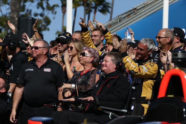 Team Owners Sam Schmidt, Ric Peterson, and the Schmidt Peterson Motorsports team celebrate in Victory Lane after winning the Toyota Grand Prix of Long Beach -- Photo by: Chris Jones