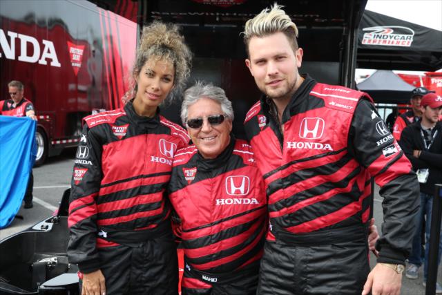 Leona Lewis and Dennis Jauch pose with Mario Andretti prior to their two-seater ride around the streets of Long Beach -- Photo by: Chris Jones