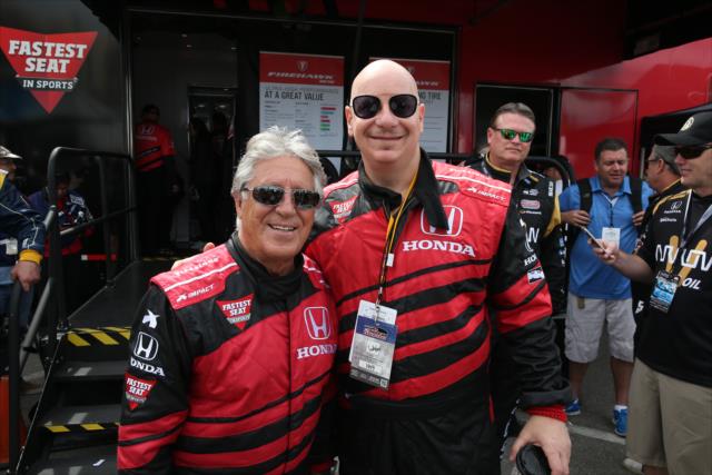 Mario Andretti and comedian Jeff Ross pose prior to their two-seater ride around the streets of Long Beach -- Photo by: Chris Jones