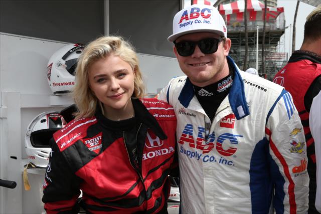 Actress ChloÃ« Grace Moretz with Conor Daly prior to her two-seater ride at Long Beach -- Photo by: Chris Jones