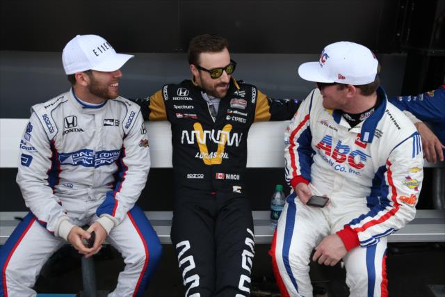Ed Jones, James Hinchcliffe, and Conor Daly chat backstage during pre-race festivities for the Toyota Grand Prix of Long Beach -- Photo by: Chris Jones