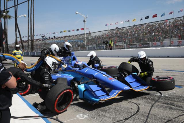 Scott Dixon comes in for tires and fuel on pit lane during the Toyota Grand Prix of Long Beach -- Photo by: Chris Jones