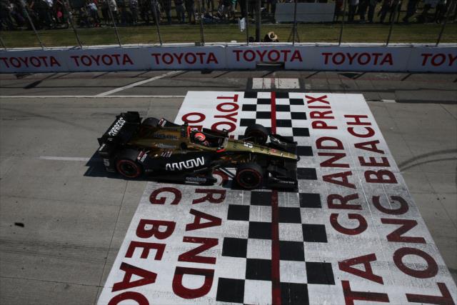 James Hinchcliffe streaks across the start-finish line during the Toyota Grand Prix of Long Beach -- Photo by: Chris Jones