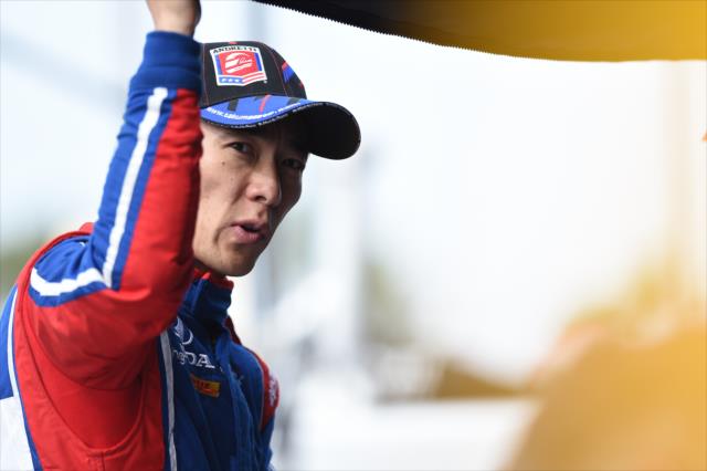 Takuma Sato chats with his engineers on pit lane following the final warmup for the Toyota Grand Prix of Long Beach -- Photo by: Christopher Owens