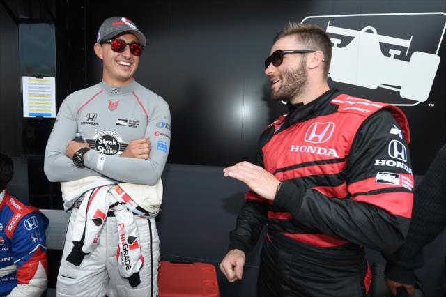Graham Rahal chats with New England Patriots wide receiver Julian Edelman during pre-race festivities for the Toyota Grand Prix of Long Beach -- Photo by: Christopher Owens