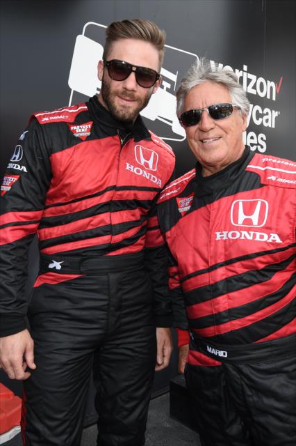 Julian Edelman and Mario Andretti pose for a photograph backstage during pre-race festivities for the Toyota Grand Prix of Long Beach -- Photo by: Christopher Owens