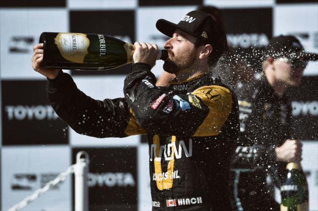 James Hinchcliffe drinks the champagne in Victory Lane following his win in the Toyota Grand Prix of Long Beach -- Photo by: Christopher Owens