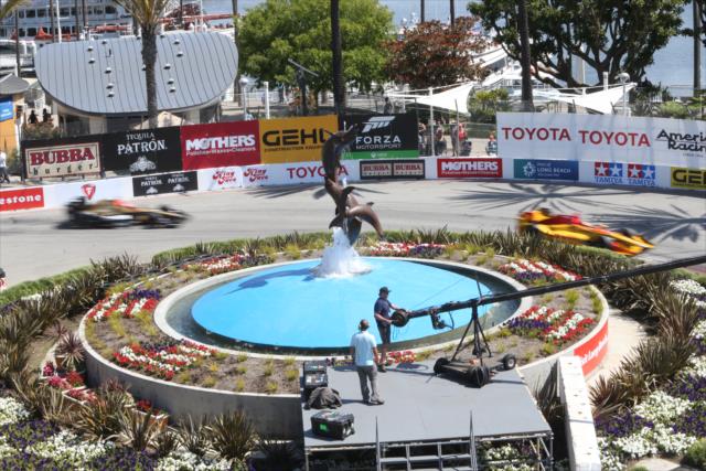 Ryan Hunter-Reay and James Hinchcliffe flash around the fountain turn during the Toyota Grand Prix of Long Beach -- Photo by: Richard Dowdy