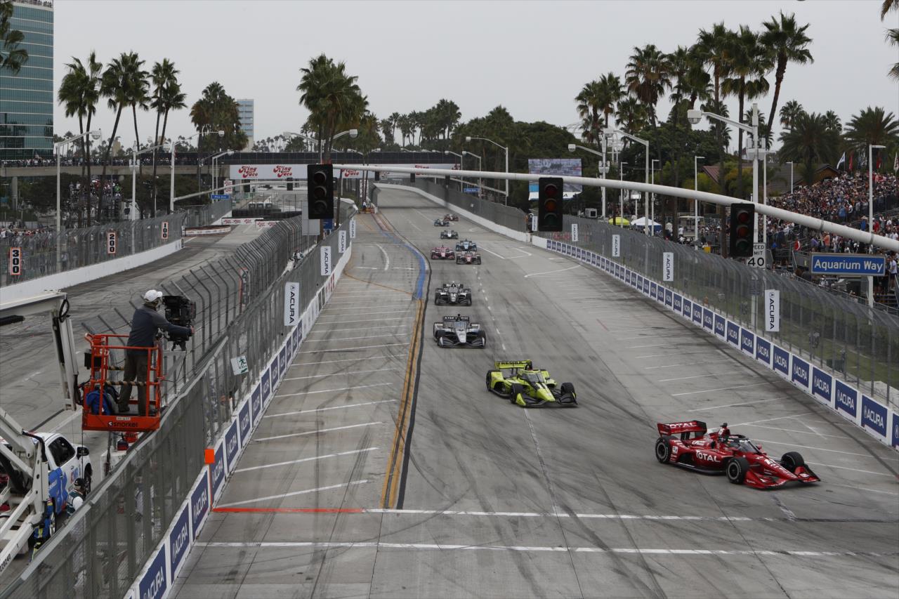 The field enters Turn 1 - Acura Grand Prix of Long Beach -- Photo by: Chris Jones