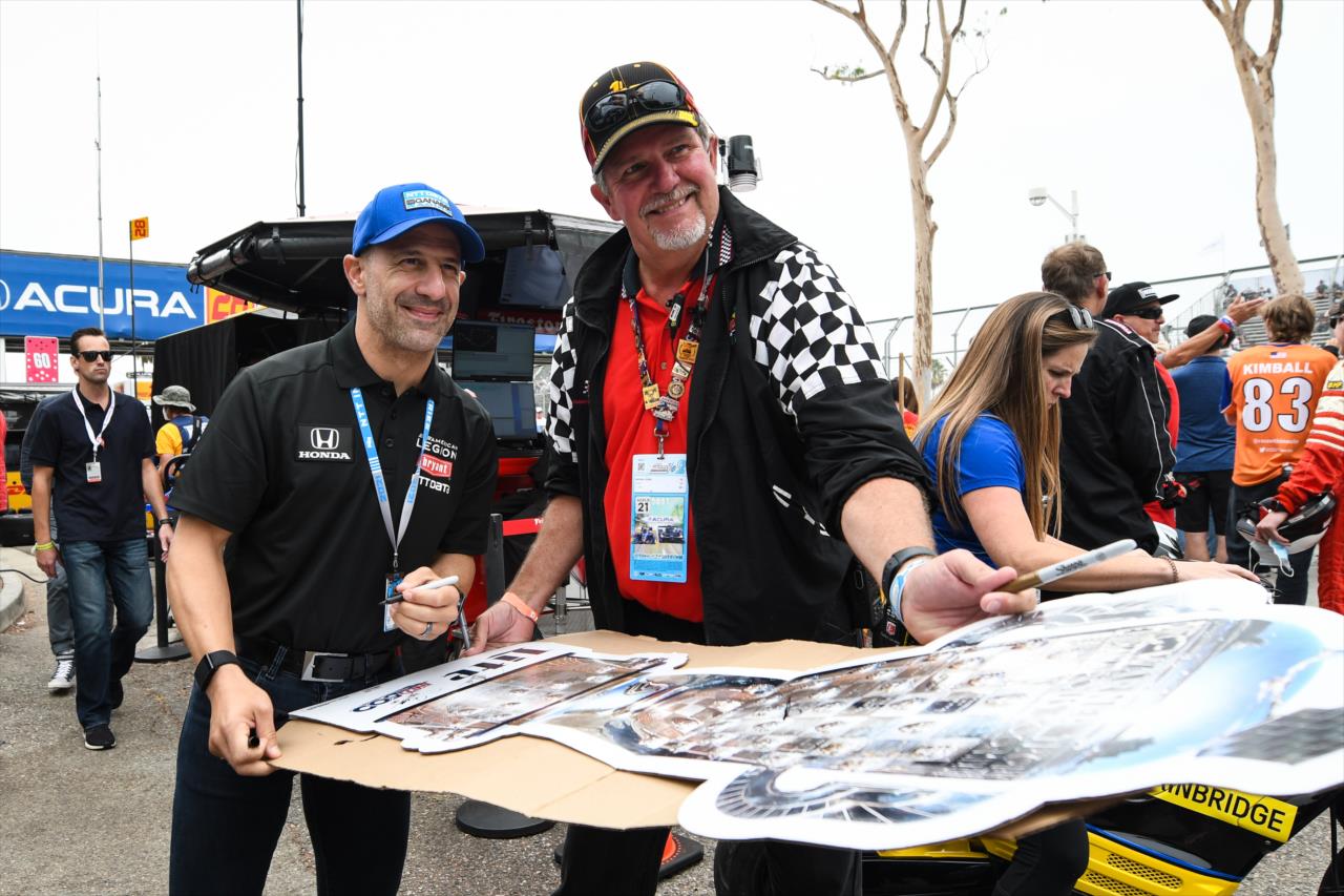 Tony Kanaan signs autographs - Acura Grand Prix of Long Beach -- Photo by: James  Black