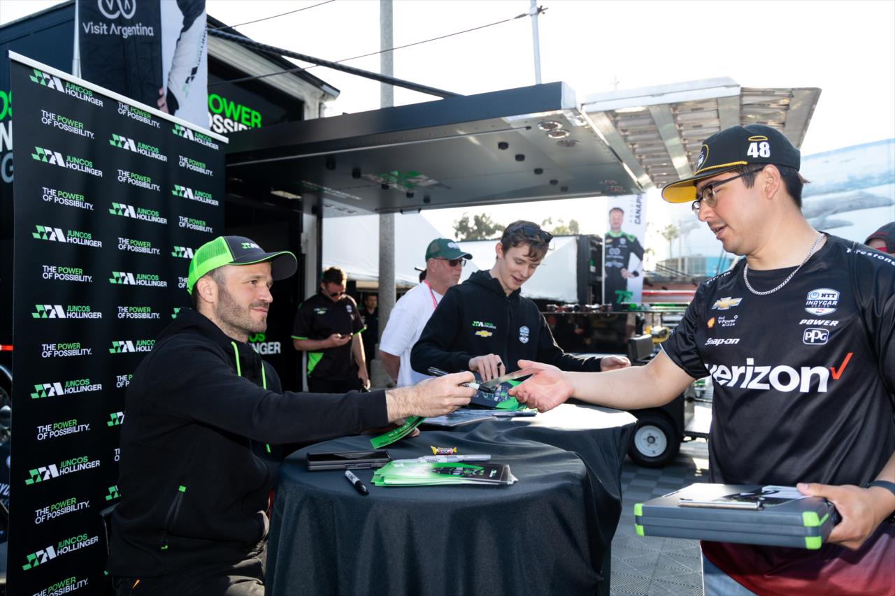 Agustin Canapino signs for a fan - Acura Grand Prix of Long Beach - By: Travis Hinkle -- Photo by: Travis Hinkle