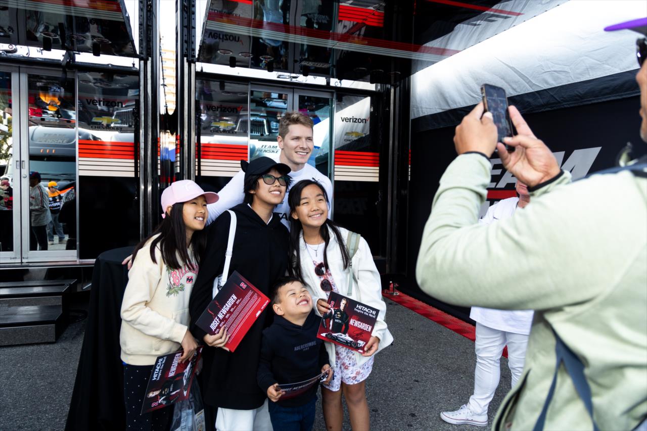 Josef Newgarden takes a photo with fans - Acura Grand Prix of Long Beach - By: Travis Hinkle -- Photo by: Travis Hinkle