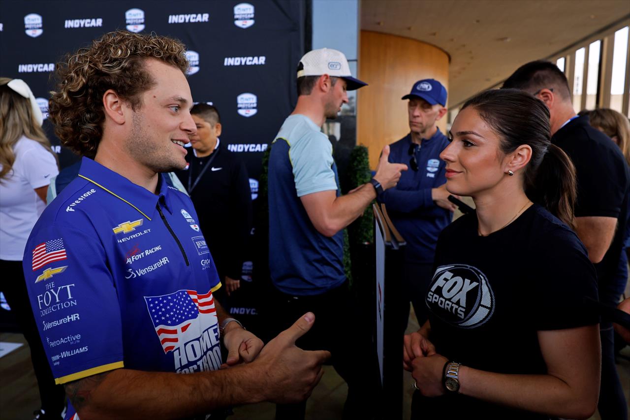 Santino Ferrucci and Georgia Henneberry - Acura Grand Prix of Long Beach - By: Paul Hurley -- Photo by: Paul Hurley