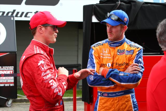 Scott Dixon and Charlie Kimball exchange notes during the Mid-Ohio open test -- Photo by: Chris Jones