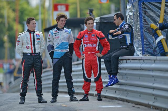 (L to R): Scott Hargrove, Matthew Brabham, and Carlos Munoz chat with Helio Castroneves at Mid-Ohio -- Photo by: John Cote