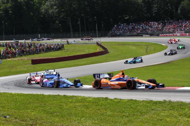 Charlie Kimball leads the field through the Esses at the Mid-Ohio Sports Car Course -- Photo by: Chris Jones