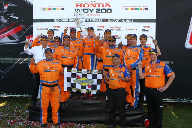 Charlie Kimball celebrates with the Novo Nordisk Chip Ganassi team on victory in the Honda Indy 200 at Mid-Ohio -- Photo by: Chris Jones
