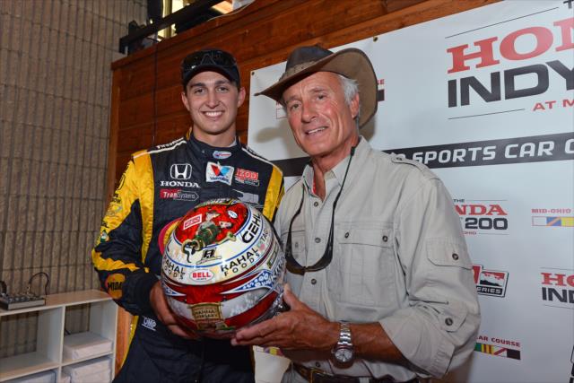 Graham Rahal and Jack Hanna show off Graham's helmet to be auctioned off -- Photo by: John Cote