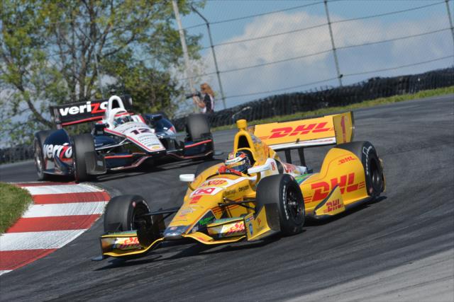 Ryan Hunter-Reay leads Will Power through the Keyhole (Turn 2) at the Mid-Ohio Sports Car Course -- Photo by: John Cote