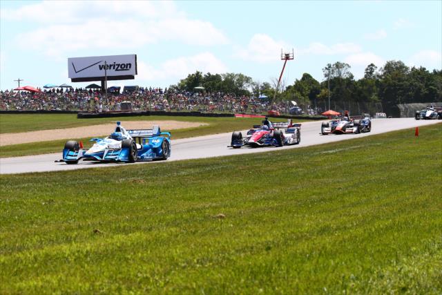 Simon Pagenaud leads a group down the backstretch during the Honda Indy 200 at Mid-Ohio -- Photo by: Bret Kelley