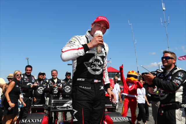 Graham Rahal enjoys a Steak-N-Shake milkshake following his win in the Honda Indy 200 at Mid-Ohio -- Photo by: Bret Kelley