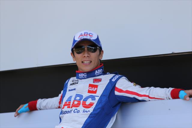 Takuma Sato with a relaxing moment during pre-race festivities for the Honda Indy 200 at Mid-Ohio -- Photo by: Chris Jones