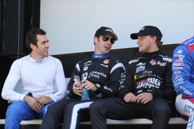 Tristan Vautier, Simon Pagenaud, and Sage Karam chat backstage during pre-race festivities for the Honda Indy 200 at Mid-Ohio -- Photo by: Chris Jones