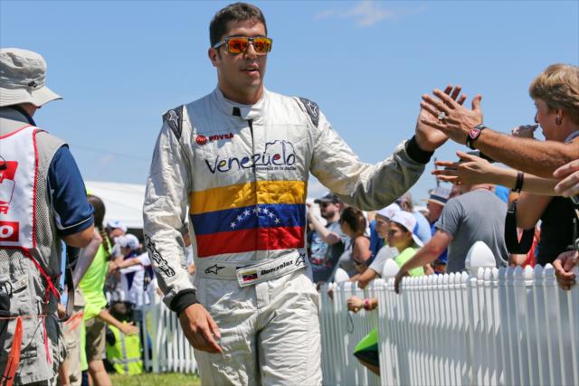 Rodolfo Gonzales greets the fans during pre-race festivities for the Honda Indy 200 at Mid-Ohio -- Photo by: Chris Jones