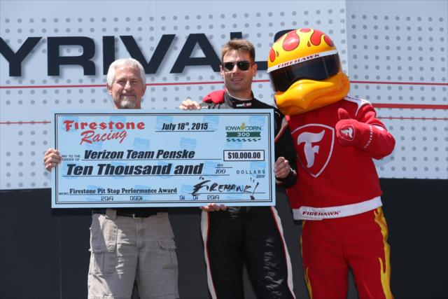 Will Power accepts the Firestone Pit Stop Performance award for Team Penske during pre-race festivities for the Honda Indy 200 at Mid-Ohio -- Photo by: Chris Jones