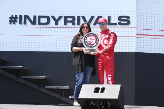 Scott Dixon accepts the Verizon P1 Award for winning the pole position during pre-race festivities for the Honda Indy 200 at Mid-Ohio -- Photo by: Chris Jones