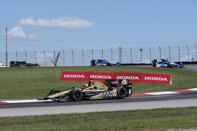 Ryan Briscoe makes his way through the Turn 2 Keyhole turn during the Honda Indy 200 at Mid-Ohio -- Photo by: Chris Jones