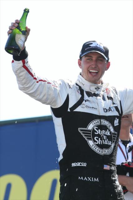 Graham Rahal celebrates his victory in Victory Circle following the Honda Indy 200 at Mid-Ohio -- Photo by: Chris Jones