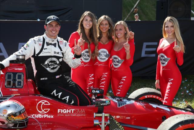 Graham Rahal celebrates with the Maxim Girls following his win in the Honda Indy 200 at Mid-Ohio -- Photo by: Chris Jones