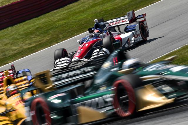 Jack Hawksworth in the middle of a group heading into Turn 5 during the Honda Indy 200 at Mid-Ohio -- Photo by: Chris Owens