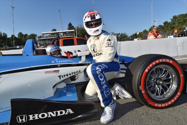 Former NFL and Ohio State Wide Receiver Joey Galloway preps for his two-seater ride at the Mid-Ohio Sports Car Course -- Photo by: John Cote