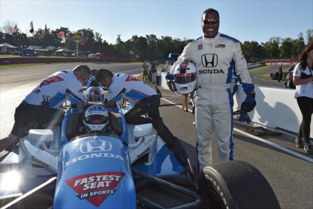 Former NFL and Ohio State Wide Receiver Joey Galloway poses following his two-seater ride at the Mid-Ohio Sports Car Course -- Photo by: John Cote