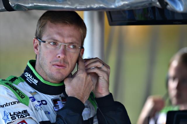 Sebastien Bourdais prepares in his pit stand prior to the final warmup for the Honda Indy 200 at Mid-Ohio -- Photo by: John Cote