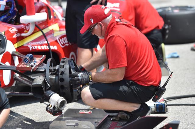 Chip Ganassi Racing engineers make suspension adjustments on pit lane during the team test at the Mid-Ohio Sports Car Course -- Photo by: Chris Owens