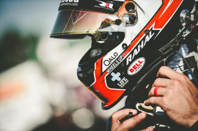 Graham Rahal straps on his helmet prior to track activity during the team test at the Mid-Ohio Sports Car Course -- Photo by: Chris Owens