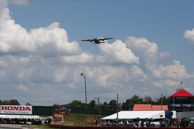 The C-130 Hercules with a flyover during pre-race festivities for the Honda Indy 200 at Mid-Ohio -- Photo by: Bret Kelley