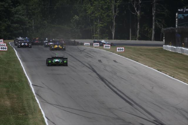The field streams into Turn 4 during the start of the Honda Indy 200 at Mid-Ohio -- Photo by: Bret Kelley