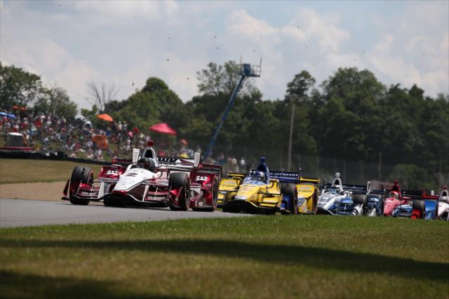 Juan Pablo Montoya leads a group down the backstretch during the Honda Indy 200 at Mid-Ohio -- Photo by: Bret Kelley