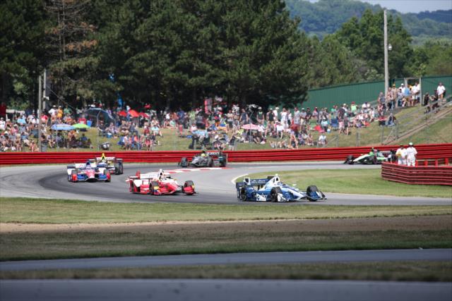 Max Chilton leads a group through Turn 1 during the Honda Indy 200 at Mid-Ohio -- Photo by: Bret Kelley