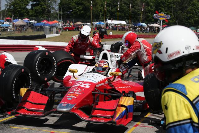Carlos Munoz comes in for tires and fuel on pit lane during the Honda Indy 200 at Mid-Ohio -- Photo by: Bret Kelley