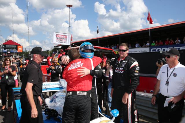 Simon Pagenaud is congratulated by his Team Penske crew after winning the Honda Indy 200 at Mid-Ohio -- Photo by: Bret Kelley