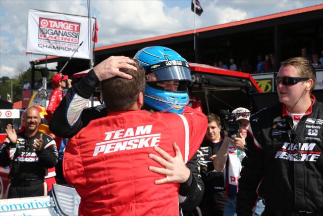 Simon Pagenaud is congratulated by his Team Penske crew following his win in the Honda Indy 200 at Mid-Ohio -- Photo by: Bret Kelley