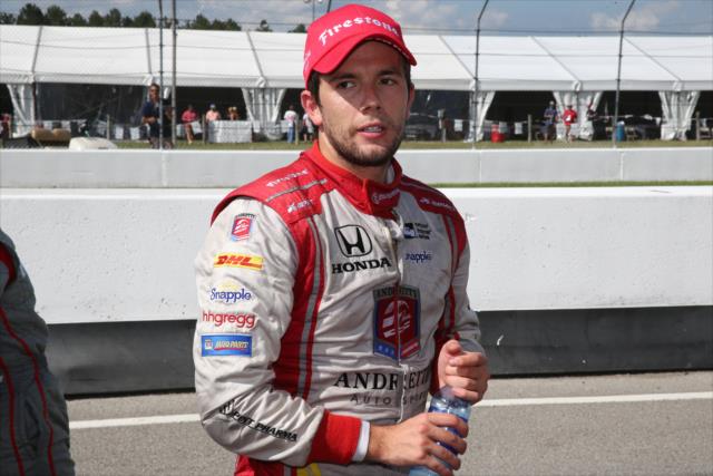 Carlos Munoz relaxes on pit lane following his 3rd Place finish in the Honda Indy 200 at Mid-Ohio -- Photo by: Bret Kelley